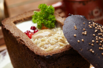 soup served in a bread bowl