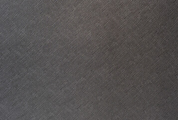 grey background from a textile material with wicker pattern, closeup.