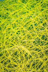 Abstract background of yellow threads on blue