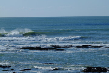 A big wave with an offshore wind.