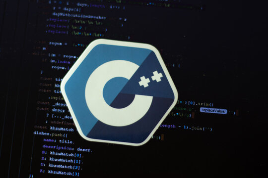 Moscow, Russia - 1 June 2020: C plus logo sign with program code on background Illustrative Editorial