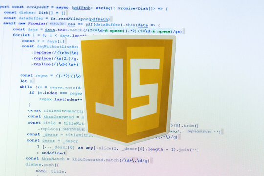 Moscow, Russia - 1 June 2020: JavaScript JS logo sign with program code on background Illustrative Editorial