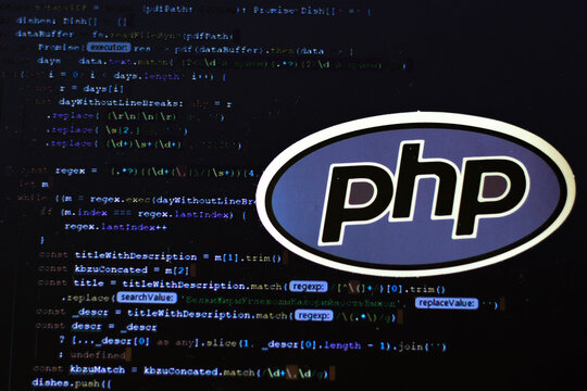 Moscow, Russia - 1 June 2020: PHP logo sign with program code on background Illustrative Editorial