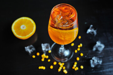 The cocktail is beautiful, delicious with lime, mint and ice in a glass