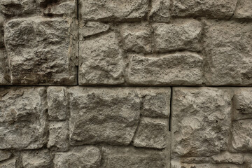 Texture of a stone wall. Stone wall as a background or texture. Old castle stone wall texture background.
