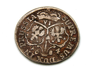 medieval European silver coin on white background