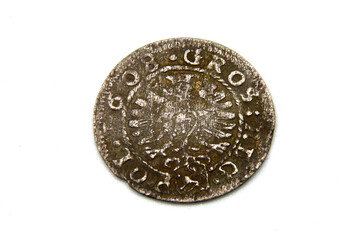 medieval European silver coin on white background
