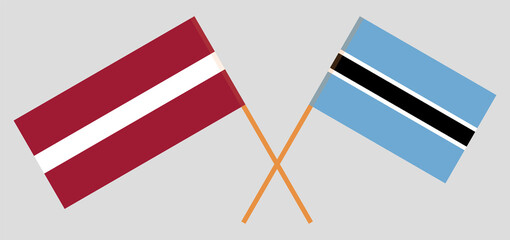 Crossed flags of Botswana and Latvia