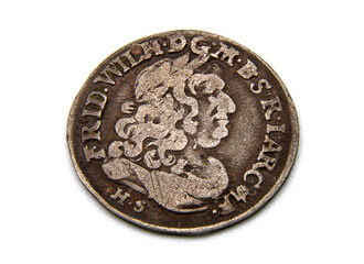 medieval European silver coin on white background