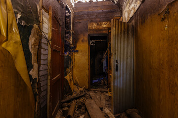 Burnt old house interior. Consequences of fire