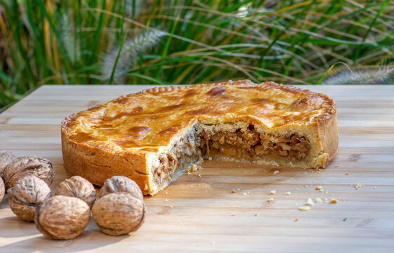 B&uuml;ndner Nusstorte, or Engadiner Nusstorte,  a traditional sweet, caramelised nut-filled pastry from canton Graub&uuml;nden in Switzerland. 