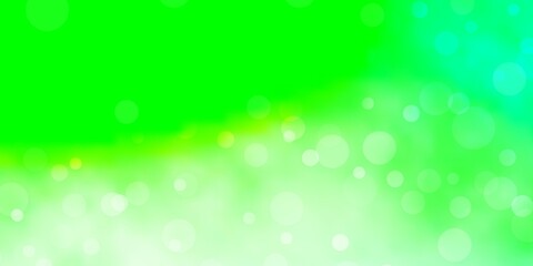 Light Green vector backdrop with dots.