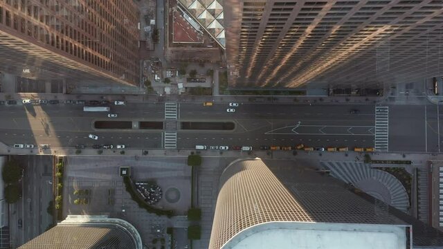 Downtown Los Angeles California Main street Grand Avenue in beautiful Sunset Light with little car traffic, Aerial Birds Eye Overhead Top Down Shot, Wide angle