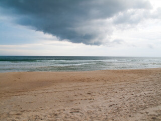 beach with rain clouds