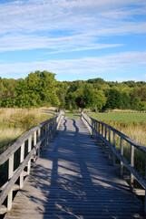 Wooden bridge leading into the woods, Manitoulin Island, ON, Canada