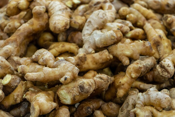 Ginger root counter at grocery store close up