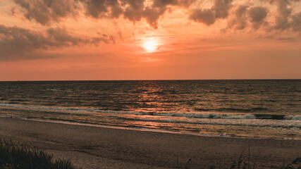 Naklejka premium sunset at the beach