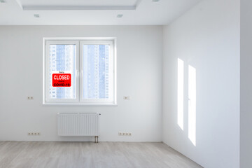 Business center closed due to COVID-19, sign with sorry in door window. Stores, restaurants, offices, other public places temporarily closed during coronavirus pandemic. Economy hit by corona virus