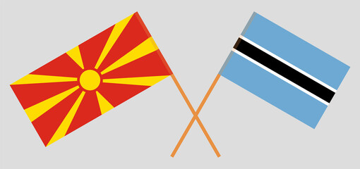 Crossed flags of Botswana and North Macedonia