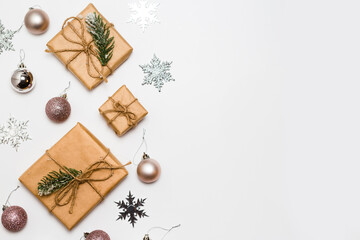 Christmas greeting card. Gift boxes and Christmas decorations layout on an isolated white background, top view. Flat lay