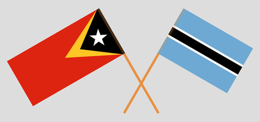 Crossed flags of Botswana and East Timor