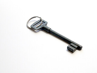 Antique iron key on a white background