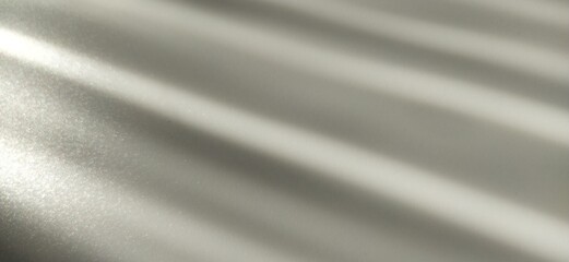 Gray striped background with oblique light effect. Play of light and shadow. Light rays. Gray and silver shades with white dots and shining stars. Diagonal lines from left to right