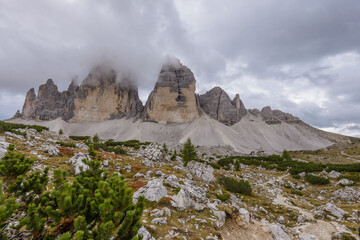 Fototapeta premium Famous Mountains - Tre Cime di Lavaredo with real reflection in lake , Dolomites Alps, Italy