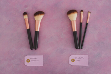 cruelty free vs animal products concept, sets of make up brushes with labels