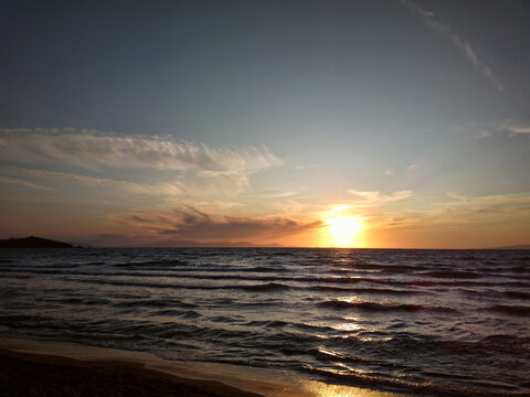 Punta Ala, Tuscany, Italy. Daylight. sunset. the sea, the beach, the blue sky, the elba island on background