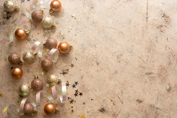 Christmas baubles with star shaped glitter and snow. Copy space.