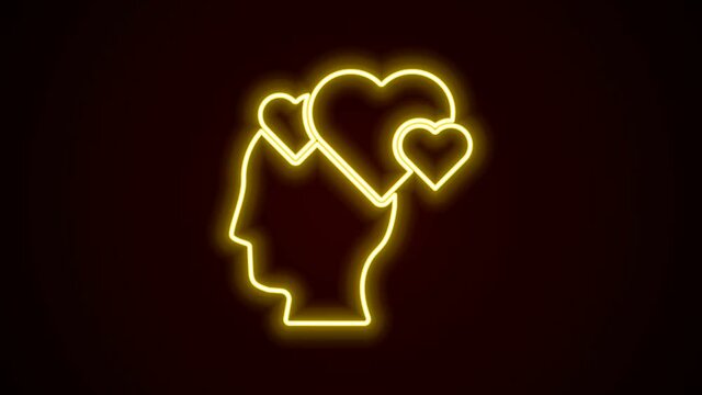 Glowing neon line Human head with heart icon isolated on black background. Love concept with human head. 4K Video motion graphic animation