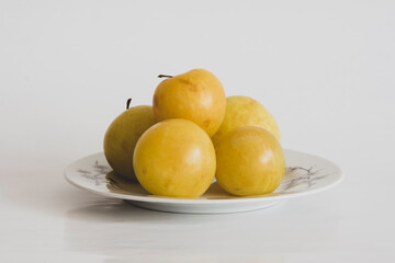 Mirabelle plums on plate