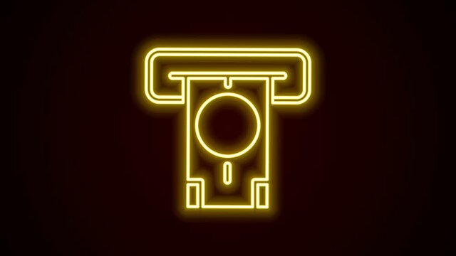 Glowing neon line ATM - Automated teller machine and money icon isolated on black background. 4K Video motion graphic animation