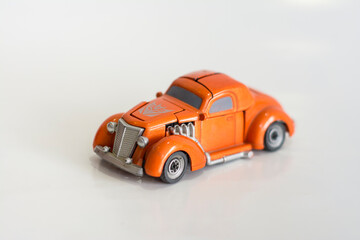 orange transformer toy car
