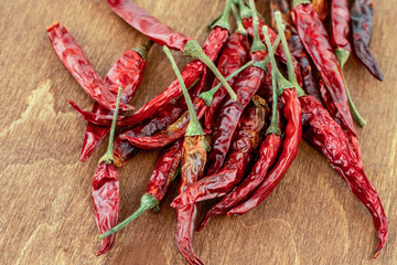 chili pepper red red slide many vegetables on wooden background