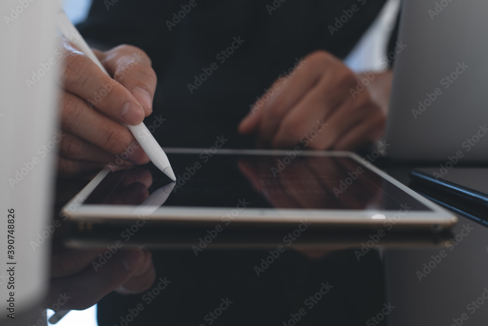 Poster man hand using stylus pen signing on digital tablet computer working in office