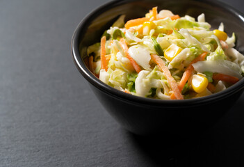 Coleslaw on a black background