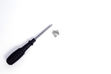 Screwdriver with screws isolated on white background