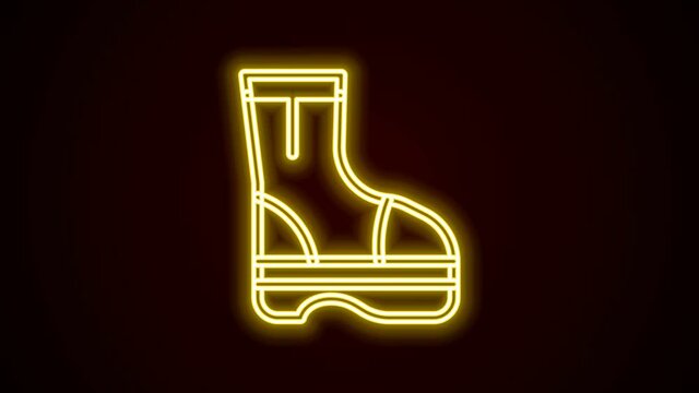 Glowing neon line Fire boots icon isolated on black background. 4K Video motion graphic animation