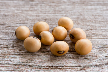 Soy beans on wooden table