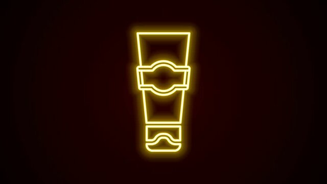 Glowing neon line Tube of toothpaste icon isolated on black background. 4K Video motion graphic animation