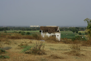 abandoned farm house in the field
