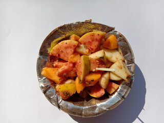 picture of indian special fruit chat made of fruits, red chilli powder, chat masala, salt, black...