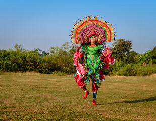  A Chhau Dancer performing Chhau dance, also spelled as Chau or Chhaau, is a semi classical Indian...