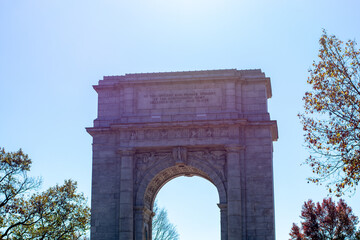 Fototapeta na wymiar The National Memorial Arch at Valley Forge National Historical Park With the Sun Shining Behind It