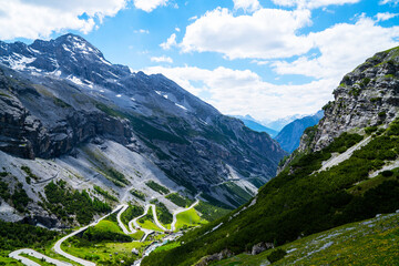 Naklejka premium Italy, Stelvio National Park. Famous road to Stelvio Pass in Ortler Alps. Alpine landscape. Panoramic view.