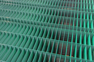Production of metal mesh for fencing.