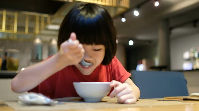 Kid eating food, happy time, breakfast
