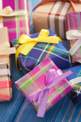 Wrapped colorful gifts with ribbons for Christmas or other celebration